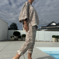 Completo 2 pezzi da donna: top e pantaloni con stampa leopardata