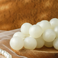 Sapone artigianale a forma di grappolo d'uva con perle