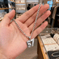 Collana con Ciondolo Numero 67