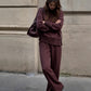 Set composto da felpa con collo alto e pantaloni con cerniera laterale