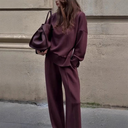 Set composto da felpa con collo alto e pantaloni con cerniera laterale