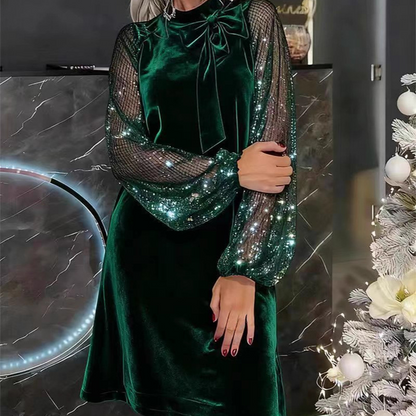 Abito da donna con fiocco al collo e paillettes