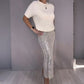Set 2 pezzi con top lavorato a maglia e gonna con paillettes per donna