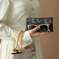 Custodia per occhiali con chiusura automatica