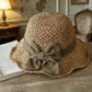 Elegante cappello da sole in paglia intrecciata con fiocco