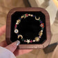 💫 SCONTO DEL 50% PER UN PERIODO LIMITATO! ✨ Bracciale con ciondoli celestiali: Sole, Luna, Stelle, Cristalli, Tonalità Oro 🪐