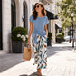 Completo donna con top a nodo laterale e pantaloni fantasia