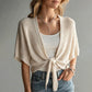 Cardigan in maglia tinta unita a maniche 3/4 con motivo traforato