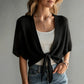 Cardigan in maglia tinta unita a maniche 3/4 con motivo traforato